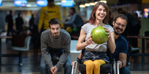 Woman in a wheelchair bowling