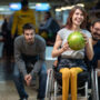 Woman in a wheelchair bowling